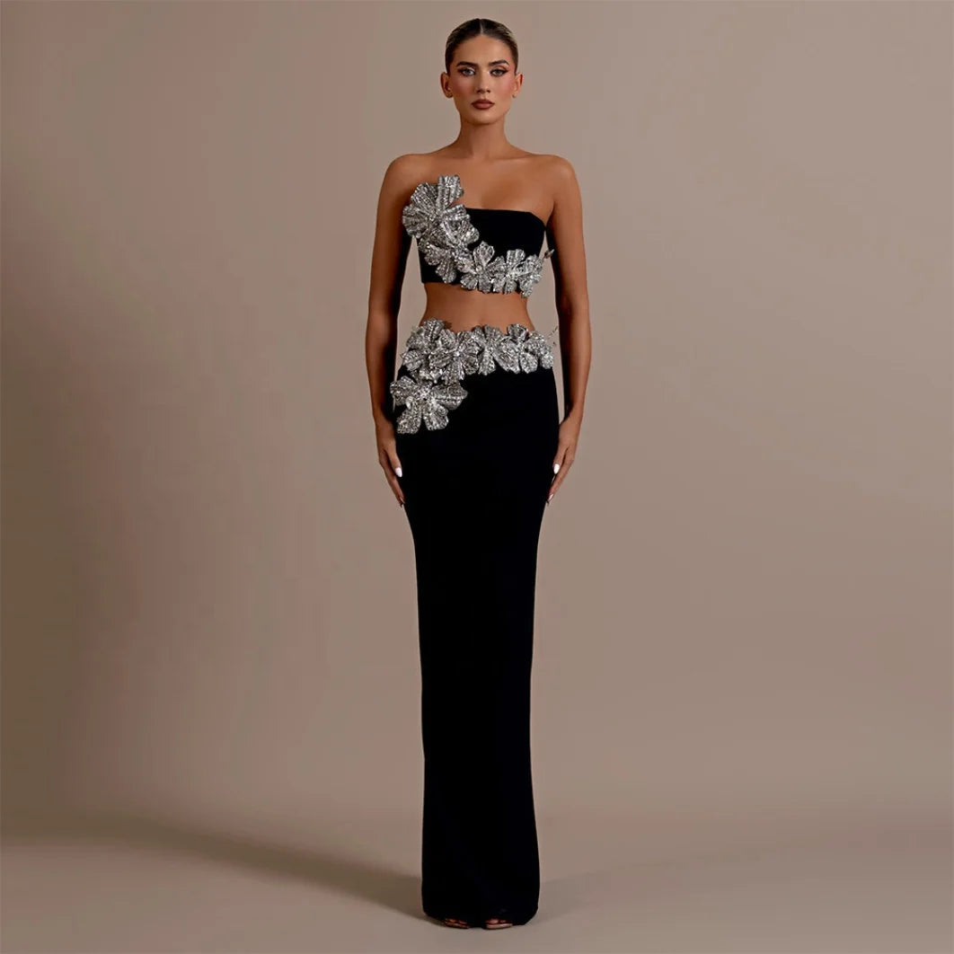 Black evening gown with silver floral embellishments on a beige background. PArty fall season high events , awards , birthday , wedding elegant chic sexy dress