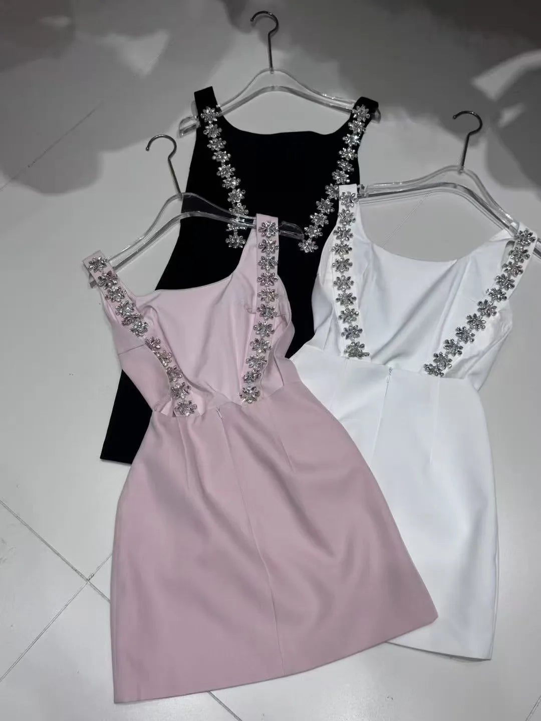 Heavy Industry Nail Drill Backless Camisole Dress for Women 2026 Summer Fashionable French Temperament Bag Buttocks Black Dress