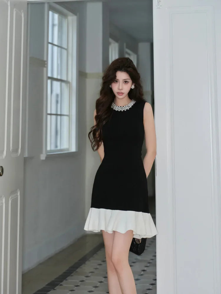 Elegant Pearl Detail Knitted Mini Sandro Dior