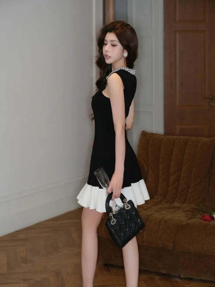 Elegant Pearl Detail Knitted Mini Sandro Dior