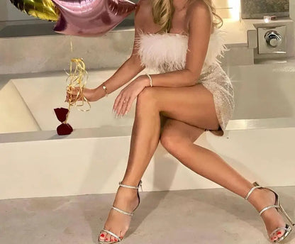 Sparkly feather party dress